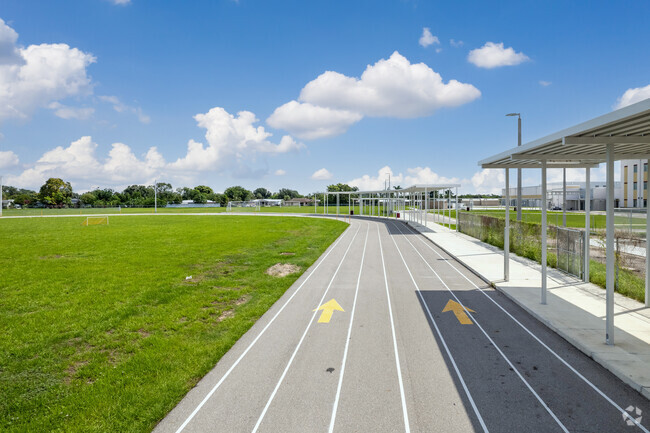 Amanecer Elementary School in Lehigh Acres running track doubles as a pickup/dropoff lane.