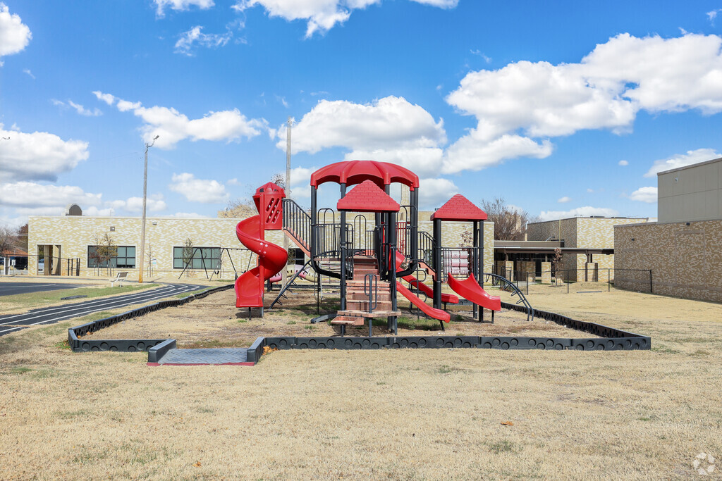 Sequoyah Elementary School offers a playground and additional swingsets.