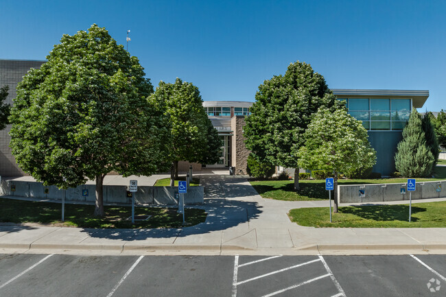 Mountain View Elementary School has large shade trees at its entrance.