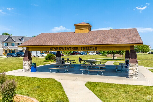 Neighbors gather at the Starkweather Shelter in Billy O'Phillips Park.