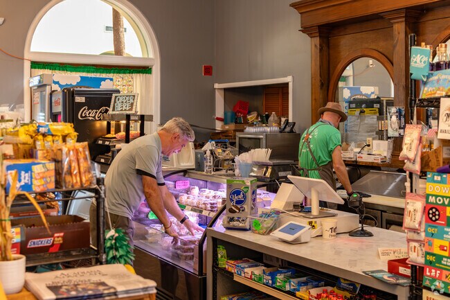 Amis Grocery stocks shelves with local goods in Lafayette’s West End.