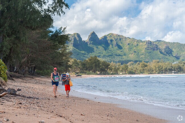 Anahola Beach is a serene stretch of golden sand, perfect for picnics and leisurely strolls.