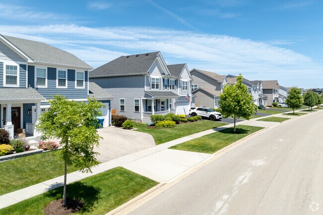 In Otter Creek, recently built homes with Craftsman influences sit on spacious lots.