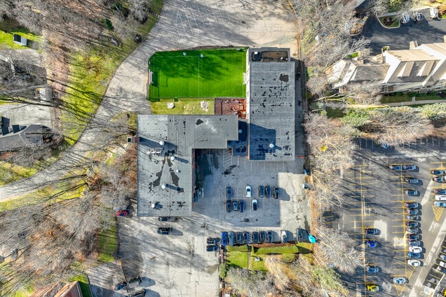 An aerial top-down view of St. John the Evangelist School in Canton, MA.