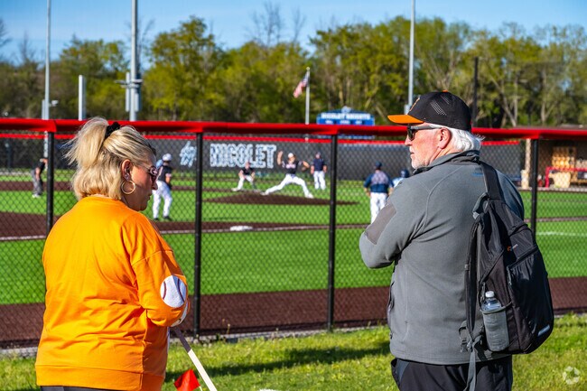 Locals enjoy a great spring day baseball game at Maslowski Glendale Community Park.