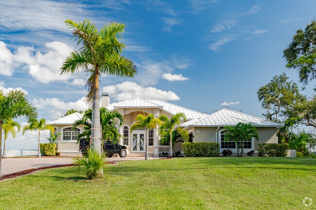 Larger contemporary style homes are seen around Lochmoor Waterway Estates.