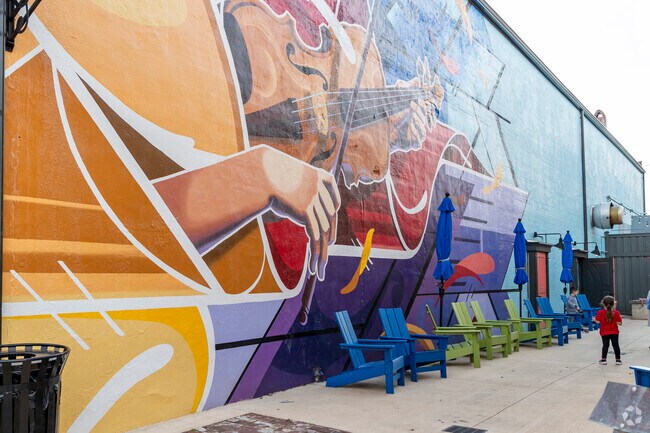 Art, music, food, and shopping about in the Square of Downtown Athens Alabama.