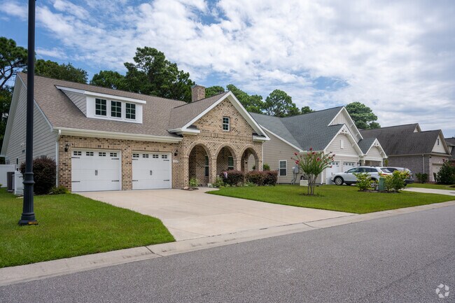 Sea Breeze features homes with well-manicured lawns.