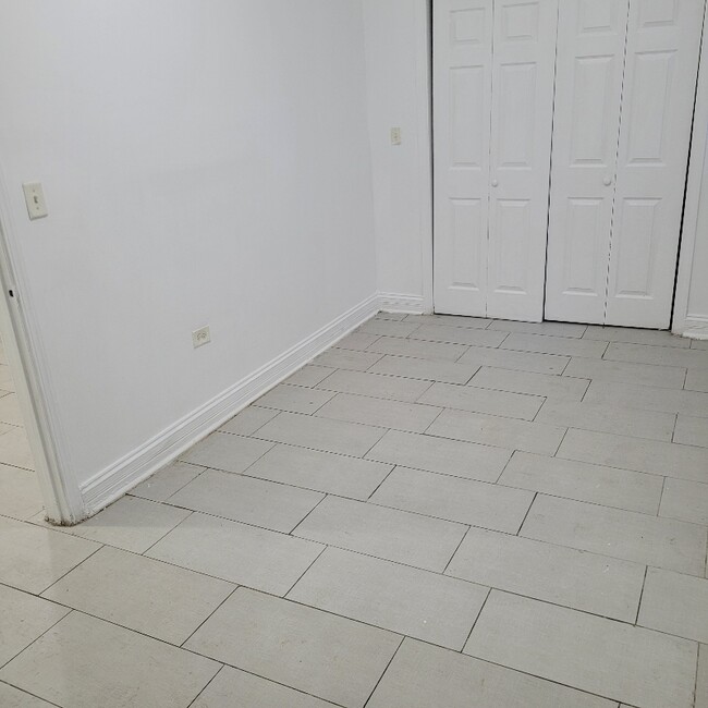 6751 S Clyde Ave unit Bsmt, Chicago, IL 60649 - photo 7