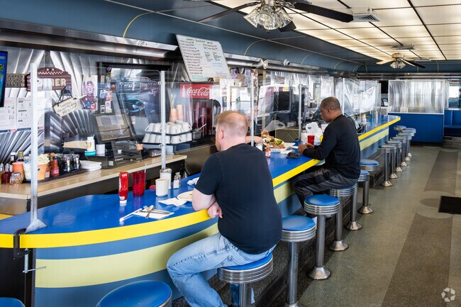 Dive into classic American cuisine at Seaplane Dining in Lower South Providence, Providence.