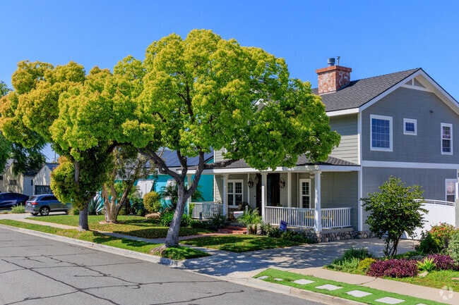 Artcraft Manor combines contrasting home designs with lush, mature tree cover.