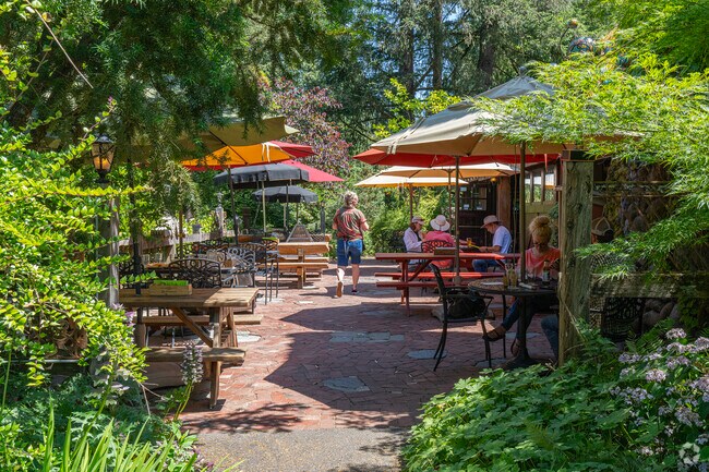 Enjoy eating in the garden like patio of McMenamins Rock Creek Tavern.