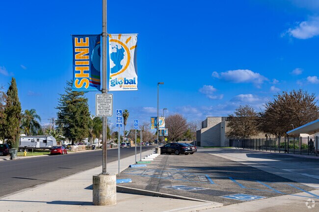 Colorful banners greet students to the entrance to Global Learning Charter School in Visalia.