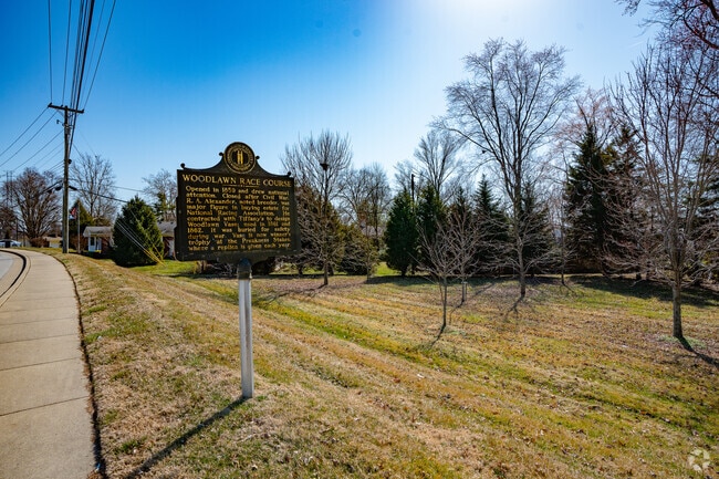 A historical marker recounts Woodlawn's past as a thoroughbred racetrack.