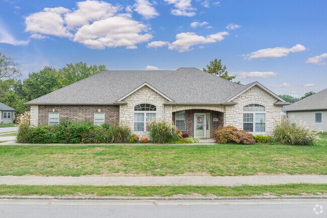 New homes with stone accents appear throughout Ashland.