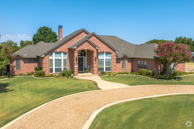 Sanger has larger homes with a traditional style and manicured lawns.