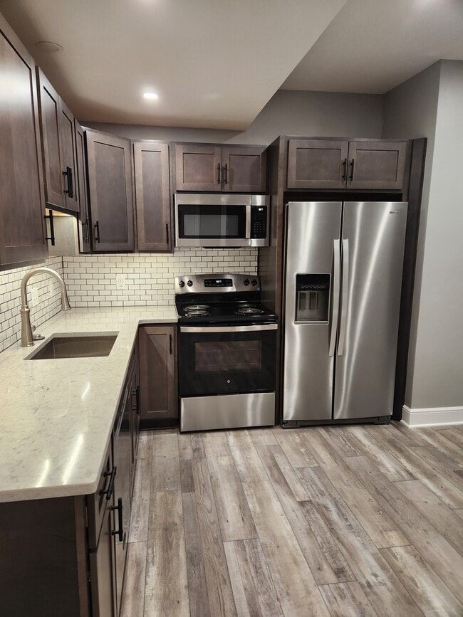 13487 Cleveland Ave NW unit C, Uniontown, OH 44685 - photo 2