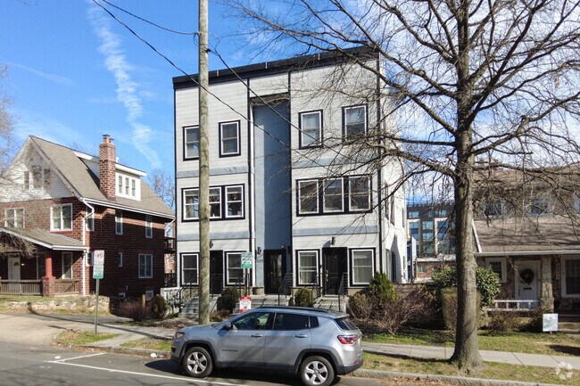 This modern duplex stands out next to single-family homes in Edgewood.