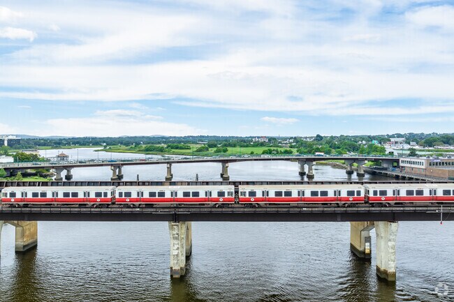 A red line MBTA train leaves North Quincy for Boston.