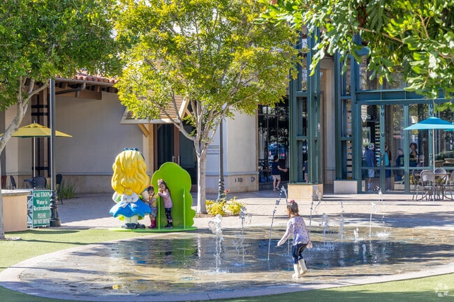 Children love to play at the fountains at the Otay Ranch Town Center.