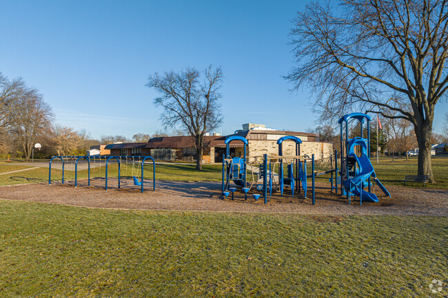 Swings, slides and open field await the students of Krug Elementary in Aurora, IL.