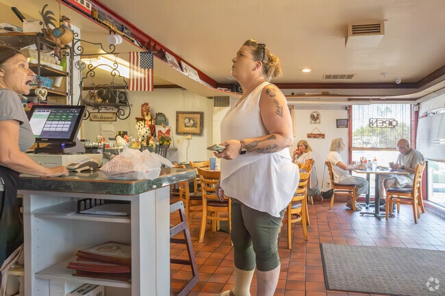Many customers swing by the Red Rooster to pick up breakfast for takeout.