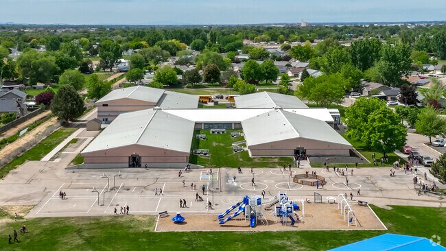 Students enjoy the open courts and acres of green space at Park Ridge Elementary for recess.