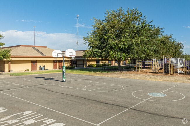 Burrel Elementary School students can play a quick game of hoops with their friends at recess.