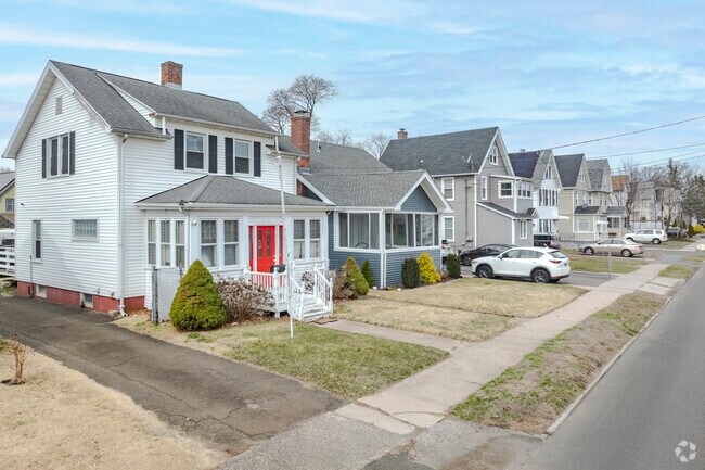 Traditional homes dot the gridded streets of West Haven Center like soldiers at attention.