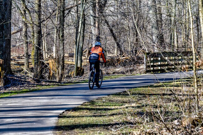 The Lansing River Trail passes through Scott Woods Park, near Clifford Park.