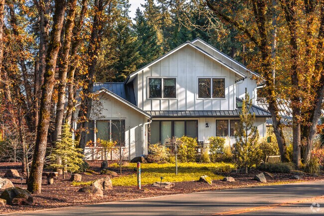 This modern two-level home sits among the trees in Lake Oswego.