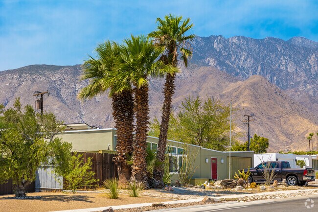 Experience upscale living with breathtaking views at Racquet Club South's prime properties.