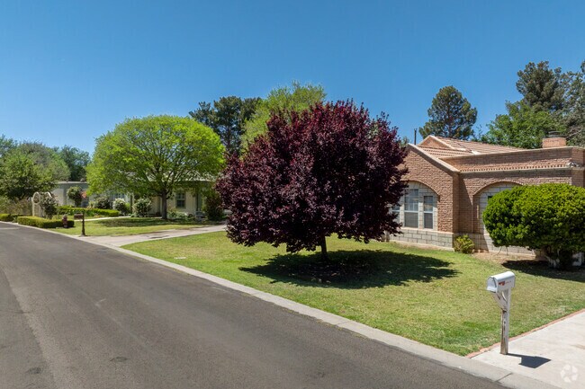 Mesilla Park’s Southwestern homes shine with stucco walls and manicured green yards.