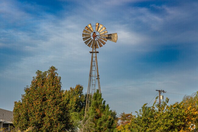 Antique windmill near a grouping of homes within the South Oklahoma City area.