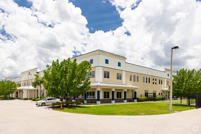 Collier Charter Academy in Naples has a driveway extending around the building.