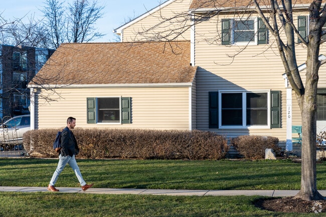 A resident walks home from the train in Downtown Palatine.