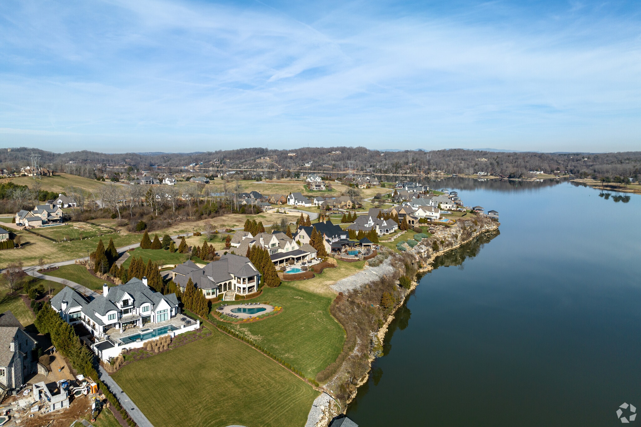 Louisville's mansions have pools and large backyards near the water.