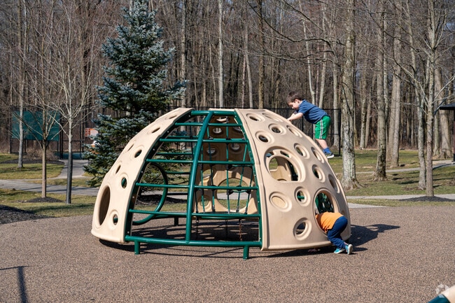 Kids enjoy the playground at Orange Village Community Park in Orange.