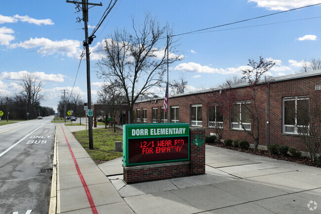 Dorr Street Elementary School sign welcomes students to the school.