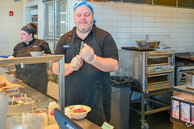 A local Culinary expert preparing a meal in Edgewater Alabama.