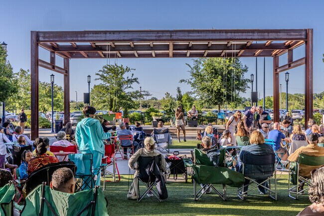 Bridgeview locals enjoy live music at Easton Town Center during the vibrant summer season.
