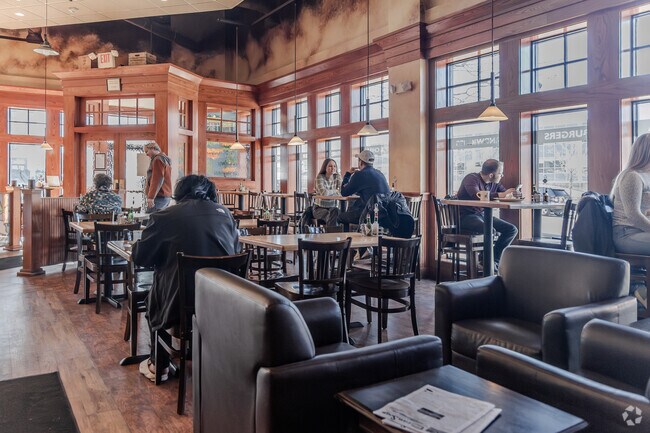 Dog Lane is known for its vibrant atmosphere, bustling with locals, and visitors in Storrs Mansfield.