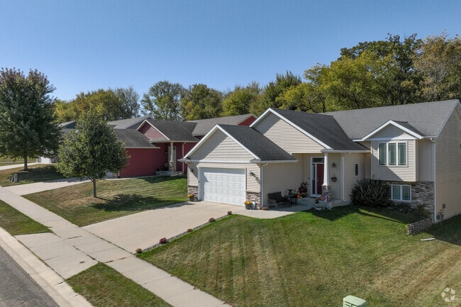 Many of the homes in Badger Hills have a mixture of siding, planking and stone on the exterior.