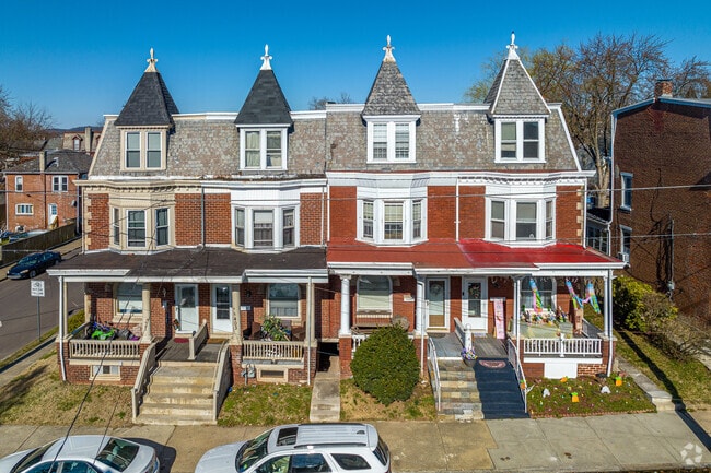 Beech-Wilson row homes display Victorian architecture with pointed turrets.