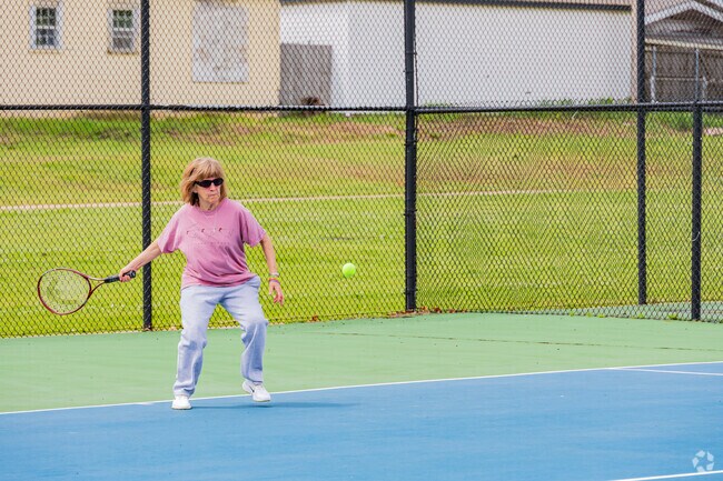 Locals love playing tennis in Memorial Park.