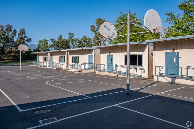 Students can shoot hoops on the basketball courts at Del Lago Elementary School.