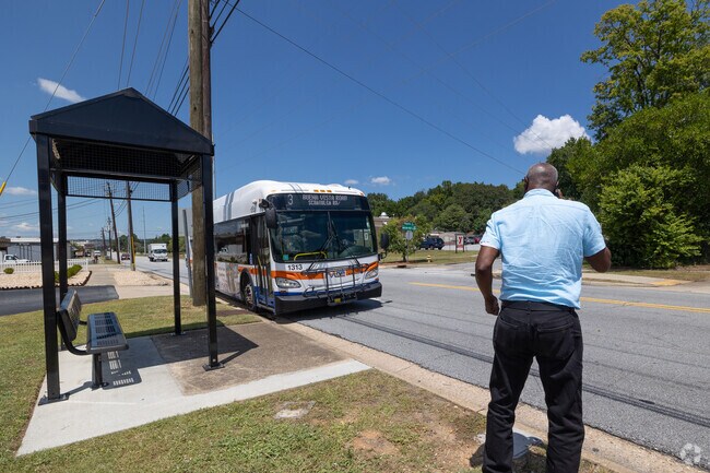 The Metra Bus Service  runs throught the Bottoms-Meelers Hill neighborhood.