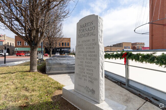 This Marion memorial honors those killed by a tornado and those who helped rebuild the city.