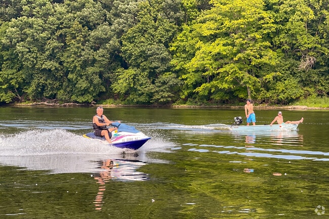 Residents of St. Charles passing by the Ferson Creek Park on Fox River.