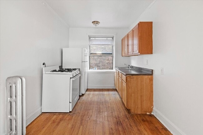 2342 W Touhy Ave unit 42-2B, Chicago, IL 60645 - photo 2